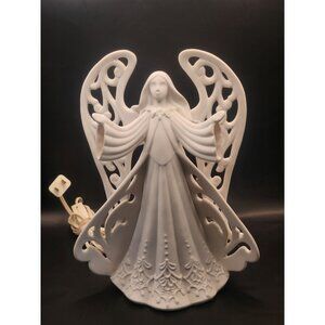 porcelain electric lighted angel figurine.